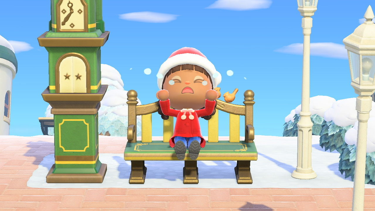 My Animal Crossing: New Horizons player sitting on a bench and crying